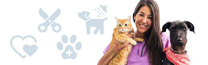 An orange tabby cat with a woman in purple next to a dog with red bandana