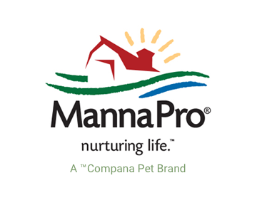 Manna Pro Logo with a gif that shows a mother duck walking along a gravel path, followed closely by her ducklings. The background is a blur of green, suggesting a natural, grassy environment. The ducklings, in a line, are mimicking the mother's movements as they all move steadily from left to right across the screen.